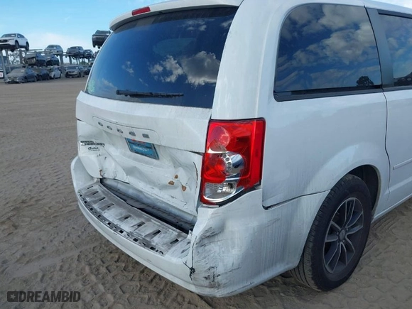 2016 Dodge Grand Caravan American Value Pkg with VIN 2C4RDGBG3GR218349, listed as a IAAI auction lot 41578385 with 130,610 mi miles. Bid and sale history available at carsss.com. Image 18.