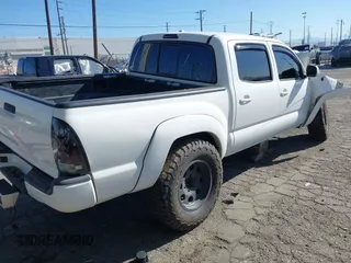2010 Toyota Tacoma PreRunner with VIN 3TMJU4GN7AM093616, listed as a IAAI auction lot 41861992 with 257,406 mi miles and . Bid and sale history available at DreamBid. Image 4.