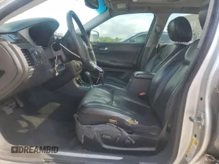 2009 Cadillac DTS 1SA z VIN 1G6KD57Y19U136085, wystawiony jako Copart lot #56983425 z przebiegiem 115 468 mil mil oraz Czysty tytuł • Clean title. Historia ofert i sprzedaży dostępna na DreamBid. Obrazek 7.