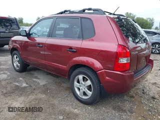 2006 Hyundai Tucson GL with VIN KM8JM12BX6U431424, listed as a IAAI auction lot 41769787 with 125,218 mi miles. Bid and sale history available at carsss.com. Image 3.