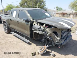 2023 GMC Canyon 4WD AT4 with VIN 1GTP6DEK5P1231432, listed as a IAAI auction lot 41785102 with 33,154 mi miles and . Bid and sale history available at carsss.com. Image 1.