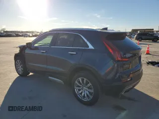 2021 Cadillac XT4 FWD Premium Luxury z VIN 1GYFZCR43MF021302, wystawiony jako Copart lot #41668755 z przebiegiem 46 047 mil mil oraz Szkody całkowita. Historia ofert i sprzedaży dostępna na DreamBid. Obrazek 2.