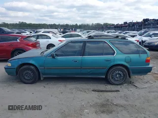 1992 Honda Accord LX with VIN 1HGCB9856NA017075, listed as a IAAI auction lot 41530791 with 205,952 mi miles. Bid and sale history available at carsss.com. Image 14.