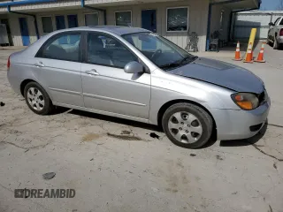2009 Kia Spectra EX with VIN KNAFE221195655309, listed as a Copart auction lot 46620985 with 105,607 mi miles and Salvage Title. Bid and sale history available at DreamBid. Image 4.