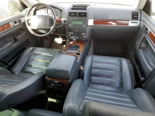 2004 Volkswagen Touareg z VIN WVGCM77L44D054387, wystawiony jako Copart lot #56009024 z przebiegiem 182 816 mil mil oraz Szkoda całkowita • Salvage title. Historia ofert i sprzedaży dostępna na DreamBid. Obrazek 8.