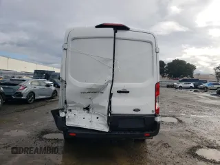 2021 Ford Transit Cargo with VIN 1FTBR1CG7MKA88875, listed as a Copart auction lot 84705324 with 23,654 mi miles and Salvage Title. Bid and sale history available at DreamBid. Image 6.