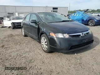 2006 Honda Civic LX z VIN 1HGFA165X6L088161, wystawiony jako Copart lot #53868135 z przebiegiem 183 370 mil mil oraz Szkoda całkowita • Salvage title. Historia ofert i sprzedaży dostępna na DreamBid. Obrazek 13.