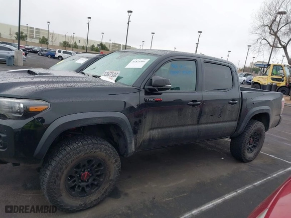 2019 Toyota Tacoma 4WD SR with VIN 5TFCZ5AN8KX205408, listed as a IAAI auction lot 41521901 with 63,387 mi miles. Bid and sale history available at carsss.com. Image 15.
