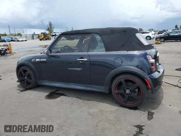 2007 MINI Convertible S with VIN WMWRH33597TJ43818, listed as a Copart auction lot 64623075 with 104,889 mi miles and Clean title. Bid and sale history available at DreamBid. Image 2.