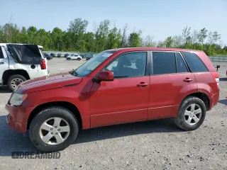 2012 Suzuki Grand Vitara Premium z VIN JS3TD0D60C4100503, wystawiony jako Copart lot #59050575 z przebiegiem 158 052 mil mil oraz Tytuł czysty. Historia ofert i sprzedaży dostępna na DreamBid. Obrazek 1.