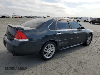 2014 Chevrolet Impala LTZ with VIN 2G1WC5E35E1106319, listed as a Copart auction lot 59260365 with 139,722 mi miles and Salvage title. Bid and sale history available at DreamBid. Image 3.