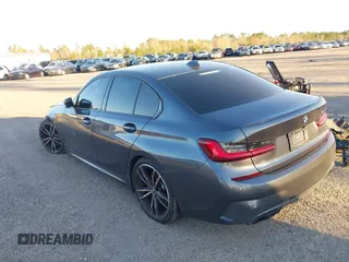 2022 BMW 3 Series M340i with VIN 3MW5U7J01N8C65375, listed as a IAAI auction lot 41688228 with 36,513 mi miles. Bid and sale history available at carsss.com. Image 3.