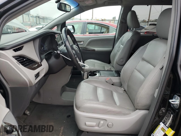 2015 Toyota Sienna XLE с VIN 5TDYK3DC6FS561960, выставлен на аукционе Copart как лот 59607355 с пробегом 110 593 миль миль и Списание • Salvage title. История ставок и продаж доступна на DreamBid. Изображение 7.