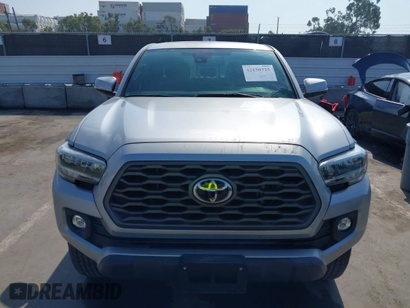 2020 Toyota Tacoma SR5 with VIN 3TMAZ5CN7LM138859, listed as a IAAI auction lot 42150725 with 36,462 mi miles and . Bid and sale history available at DreamBid. Image 12.
