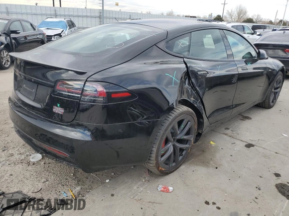 2024 Tesla Model S Plaid z VIN 5YJSA1E65RF543822, wystawiony jako Copart lot #48545205 z przebiegiem 2 473 mil mil oraz Szkoda całkowita • Salvage title. Historia ofert i sprzedaży dostępna na DreamBid. Obrazek 3.