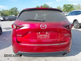 2020 Mazda CX-5 Touring with VIN JM3KFACMXL1819518, listed as a IAAI auction lot 41911679 with 50,357 mi miles and . Bid and sale history available at carsss.com. Image 17.