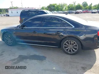 2012 Audi A8 with VIN WAUAVAFD8CN029546, listed as a IAAI auction lot 42216382 with 144,989 mi miles and . Bid and sale history available at DreamBid. Image 14.