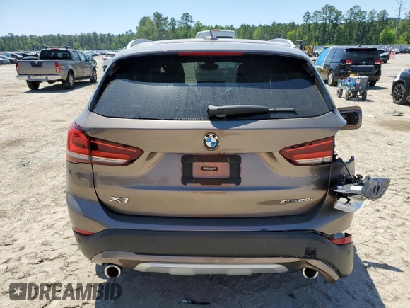2020 BMW X1 xDrive28i z VIN WBXJG9C09L5R23653, wystawiony jako Copart lot #52771535 z przebiegiem 54 550 mil mil oraz Szkoda całkowita • Salvage title. Historia ofert i sprzedaży dostępna na DreamBid. Obrazek 6.