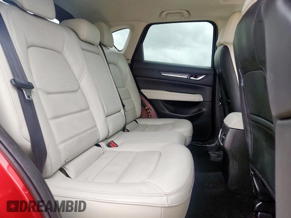 2018 Mazda CX-5 Grand Touring with VIN JM3KFADM8J0451535, listed as a Copart auction lot 59990435 with 77,163 mi miles and Salvage title. Bid and sale history available at DreamBid. Image 11.