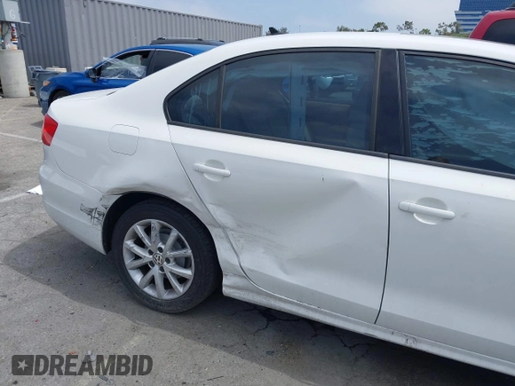 2011 Volkswagen Jetta SE with VIN 3VWDX7AJ2BM345251, listed as a IAAI auction lot 42407502 with 110,121 mi miles and . Bid and sale history available at DreamBid. Image 6.