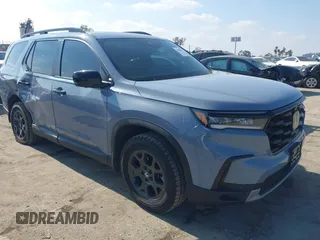 2023 Honda Pilot TrailSport with VIN 5FNYG1H64PB055172, listed as a IAAI auction lot 41458372 with 24,875 mi miles. Bid and sale history available at carsss.com. Image 1.