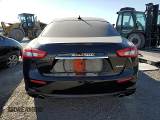 2018 Maserati Ghibli with VIN ZAM57XSA4J1268685, listed as a Copart auction lot 62302313 with 76,576 mi miles. Bid and sale history available at carsss.com. Image 6.