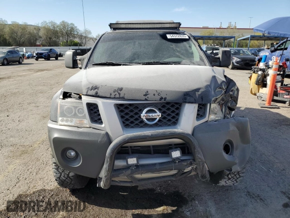 2013 Nissan Xterra S z VIN 5N1AN0NW7DN823046, wystawiony jako Copart lot #54372835 z przebiegiem 163 384 mil mil oraz Szkoda całkowita • Salvage title. Historia ofert i sprzedaży dostępna na DreamBid. Obrazek 5.