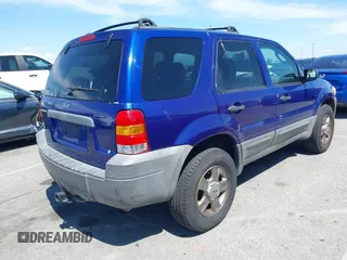 2005 Ford Escape XLS Value with VIN 1FMYU02Z85KD90338, listed as a IAAI auction lot 41916569 with 174,870 mi miles. Bid and sale history available at carsss.com. Image 4.
