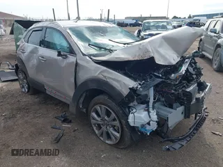 2023 Mazda CX-30 S Premium with VIN 3MVDMBDMXPM563500, listed as a IAAI auction lot 42092423 with 9,148 mi miles and . Bid and sale history available at DreamBid. Image 1.