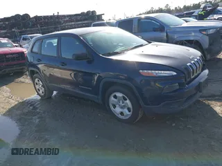 2015 Jeep Cherokee Sport with VIN 1C4PJLAB2FW547371, listed as a IAAI auction lot 41588682 with 135,640 mi miles. Bid and sale history available at carsss.com. Image 1.