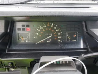 1991 Mitsubishi Mighty Max z VIN JA7FL25W7MP028365, wystawiony jako Copart lot #43964285 z przebiegiem 175 102 mil mil oraz Szkody całkowita. Historia ofert i sprzedaży dostępna na DreamBid. Obrazek 9.