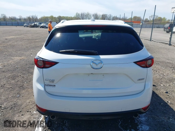 2018 Mazda CX-5 Grand Touring with VIN JM3KFBDM0J0404635, listed as a IAAI auction lot 41883068 with 71,178 mi miles. Bid and sale history available at carsss.com. Image 16.