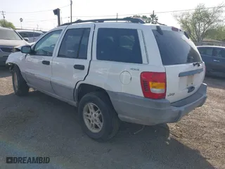 1999 Jeep Grand Cherokee Laredo with VIN 1J4GW58S9XC510088, listed as a IAAI auction lot 41724456 with 1 mi miles. Bid and sale history available at carsss.com. Image 3.