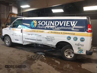 2020 Chevrolet Express Cargo Van with VIN 1GCWGBFB4L1205443, listed as a IAAI auction lot 41612714 with 87,883 mi miles. Bid and sale history available at carsss.com. Image 6.