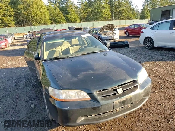 2000 Honda Accord EX z VIN JHMCG5659YC033886, wystawiony jako Copart lot #87952845 z przebiegiem 317 730 mil mil oraz Szkoda całkowita • Salvage title. Historia ofert i sprzedaży dostępna na DreamBid. Obrazek 11.