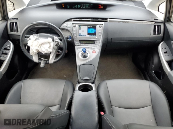 2012 Toyota Prius z VIN JTDKN3DP0C3023168, wystawiony jako Copart lot #52227235 z przebiegiem 79 950 mil mil oraz Czysty tytuł • Clean title. Historia ofert i sprzedaży dostępna na DreamBid. Obrazek 8.