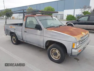 1991 Nissan Frontier XE z VIN 1N6SD11S8MC313088, wystawiony jako IAAI lot #42044351 z przebiegiem 117 342 mil mil oraz . Historia ofert i sprzedaży dostępna na DreamBid. Obrazek 1.
