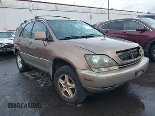 1999 Lexus RX 300 Luxury SUV with VIN JT6HF10U5X0061520, listed as a IAAI auction lot 41612890 with 254,864 mi miles. Bid and sale history available at carsss.com. Image 1.