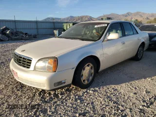 2001 Cadillac DeVille DHS z VIN 1G6KE57Y31U229255, wystawiony jako Copart lot #75101214 z przebiegiem 141 187 mil mil oraz Czysty tytuł • Clean title. Historia ofert i sprzedaży dostępna na DreamBid. Obrazek 1.