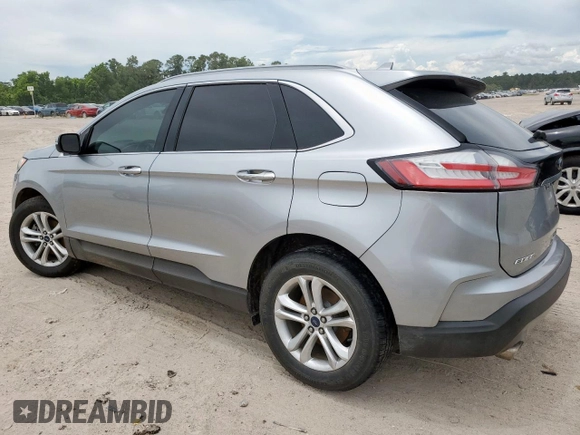 2020 Ford Edge SEL with VIN 2FMPK3J90LBA71592, listed as a Copart auction lot 62362655 with 100,040 mi miles and Salvage title. Bid and sale history available at DreamBid. Image 2.