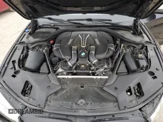 2018 BMW 5 Series M550i xDrive with VIN WBAJB9C56JB049524, listed as a Copart auction lot 43511805 with 55,759 mi miles and Salvage title. Bid and sale history available at DreamBid. Image 11.