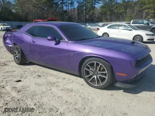 2023 Dodge Challenger R/T with VIN 2C3CDZBT4PH641496, listed as a Copart auction lot 45102185 with 10,751 mi miles and Salvage Title. Bid and sale history available at carsss.com. Image 4.