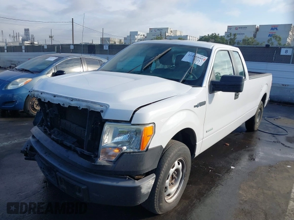 2014 Ford F-150 XL with VIN 1FTFX1CTXEKE24914, listed as a IAAI auction lot 41426666 with 141,451 mi miles. Bid and sale history available at carsss.com. Image 17.
