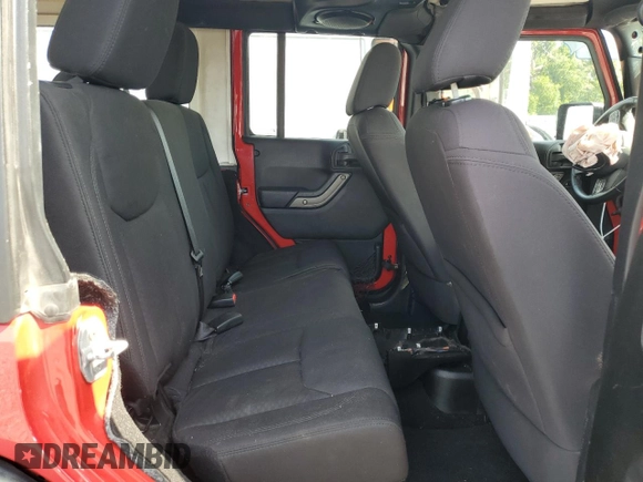 2013 Jeep Wrangler Unlimited Sport z VIN 1C4BJWDG1DL694556, wystawiony jako Copart lot #58730525 z przebiegiem Nie podano mil oraz Szkoda całkowita • Salvage title. Historia ofert i sprzedaży dostępna na DreamBid. Obrazek 10.