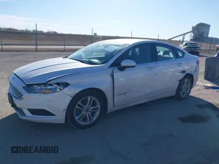 2018 Ford Fusion Hybrid SE with VIN 3FA6P0LU4JR152682, listed as a IAAI auction lot 41691305 with 142,059 mi miles. Bid and sale history available at carsss.com. Image 2.