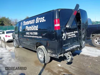 2017 Chevrolet Express Cargo Van with VIN 1GCWGBFF9H1112640, listed as a IAAI auction lot 41401549 with 157,773 mi miles. Bid and sale history available at carsss.com. Image 3.