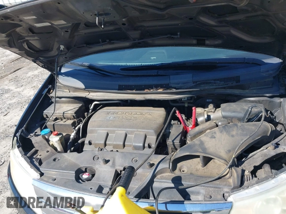 2011 Honda Odyssey EX-L with VIN 5FNRL5H67BB087064, listed as a IAAI auction lot 42326427 with 177,795 mi miles and . Bid and sale history available at DreamBid. Image 10.
