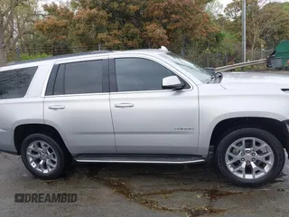 2015 GMC Yukon SLT with VIN 1GKS2BKC0FR676107, listed as a IAAI auction lot 41962929 with 132,389 mi miles. Bid and sale history available at carsss.com. Image 14.