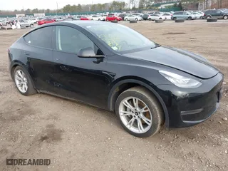 2023 Tesla Model Y Long Range with VIN 7SAYGDEEXPA025946, listed as a IAAI auction lot 41903843 with 107,977 mi miles. Bid and sale history available at carsss.com. Image 1.