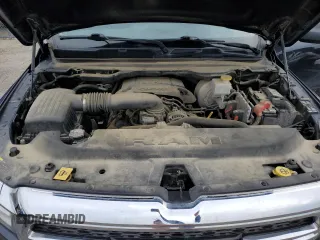 2019 Ram 1500 Tradesman z VIN 1C6SRFCT4KN662300, wystawiony jako Copart lot #52959345 z przebiegiem 133 477 mil mil oraz Szkoda całkowita • Salvage title. Historia ofert i sprzedaży dostępna na DreamBid. Obrazek 11.